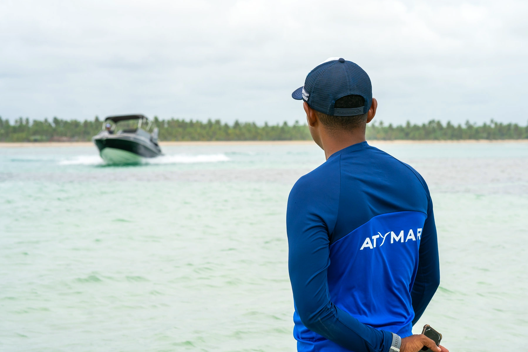 Atymar team member watching a boat run